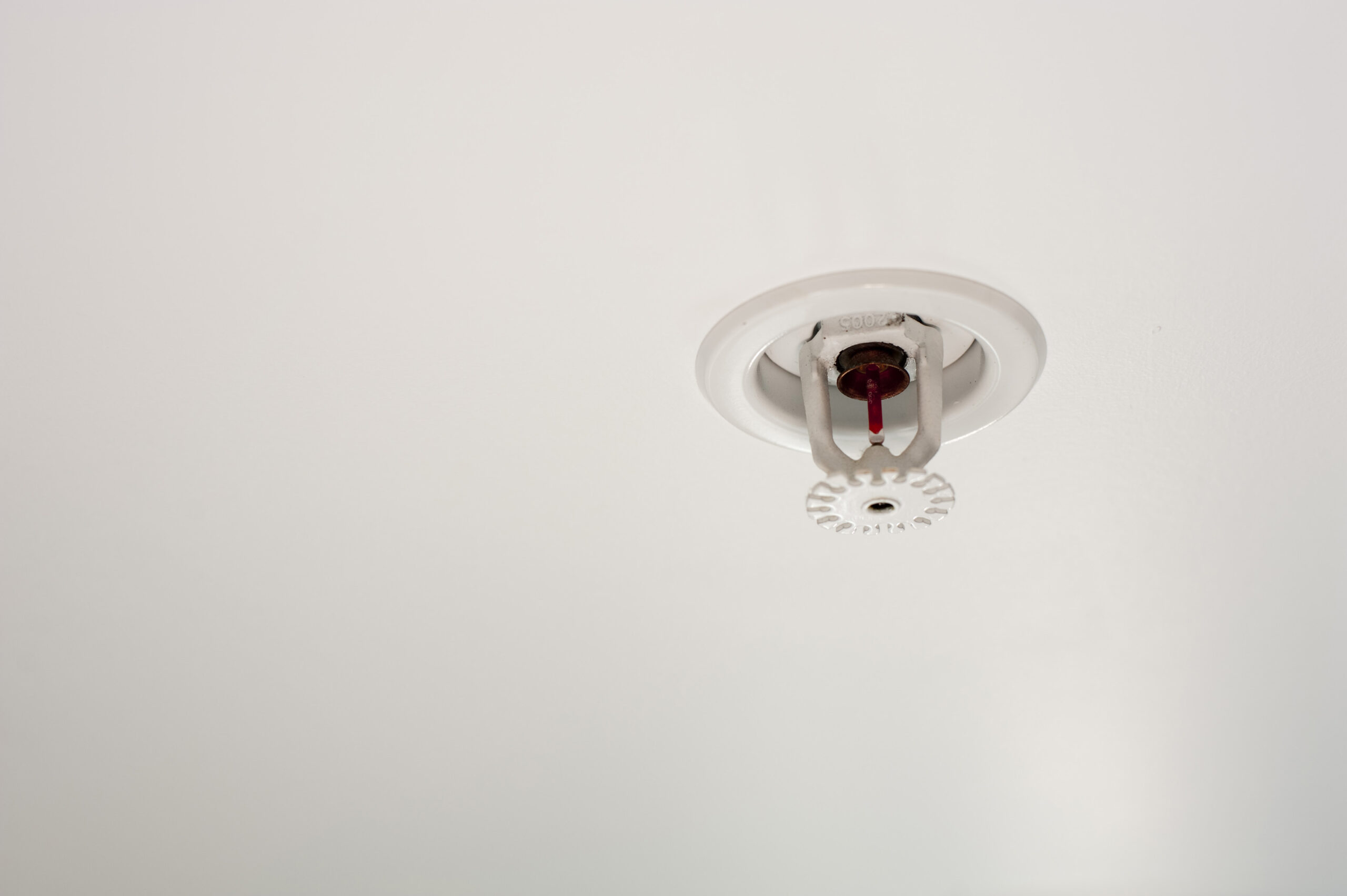 White Water Sprinkler on White Ceiling